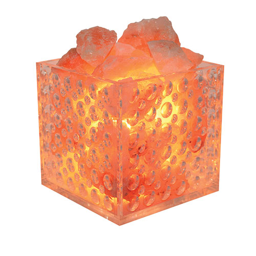 <ul><li>Acrylic bubble patterned base holds 100% pure pink Himalayan salt crystals have been used for centuries for their therapeutic properties</li><li>Emits negative ions that attach themselves to indoor air pollutants causing them to fall to the floor</li><li>Therapeutic amber glow helps create a sense of tranquility</li><li>6' AC power cord with dimmer switch</li><li>For use with up to 15W bulbs; bulb included</li><li>6" x 6" x 6"</li></ul>